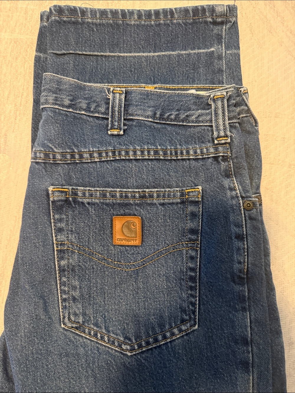 Carhartt Medium Blue Denim Work Jeans with Leather Patch